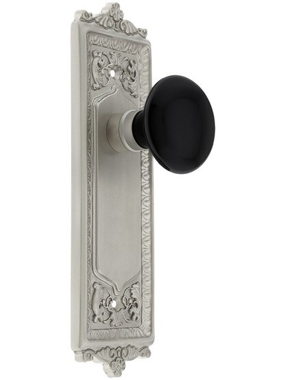 Egg and Dart Plate with Black Porcelain Knob without Keyhole in Satin Nickel.
